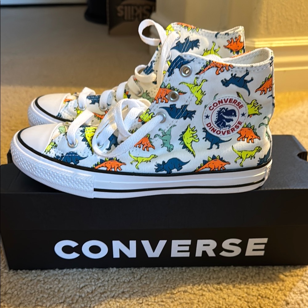 Converse Dinosaur Print High Tops.  New. Never worn.